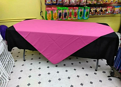 Table with cloth and diamond.