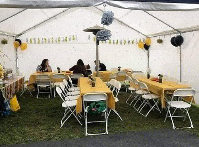 This is a graduation party with 20x20 canopy and heater inside.